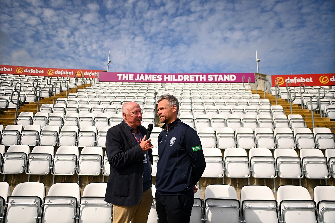 Vic Marks interviews James Hildreth in front of the James Hildreth Stand