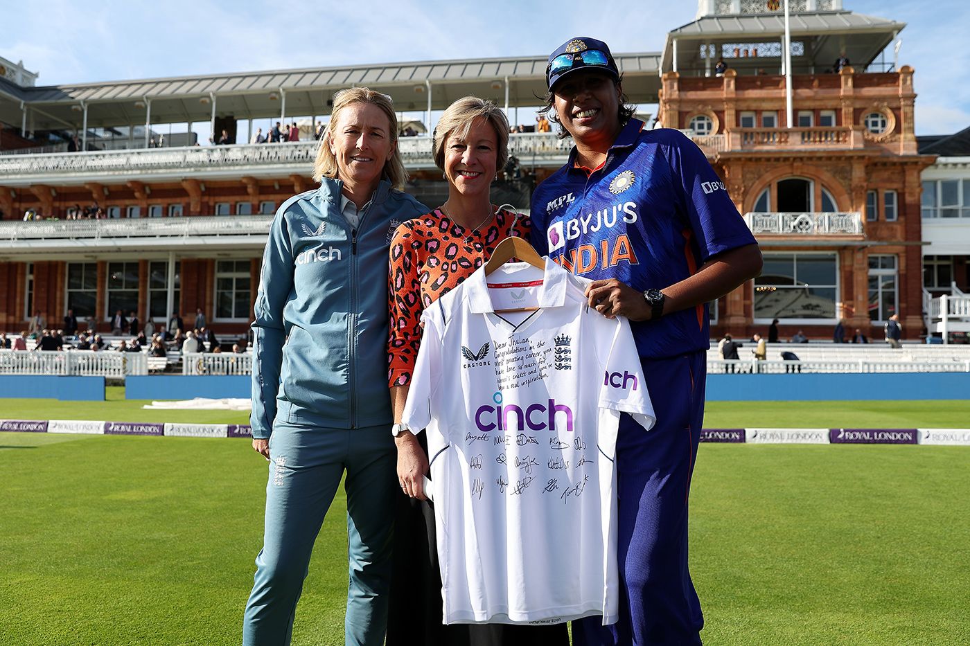 Head Coach Lisa Keightley and ECB Interim Chief Executive Clare Connor present Jhulan Goswami with a signed shirt from the England team