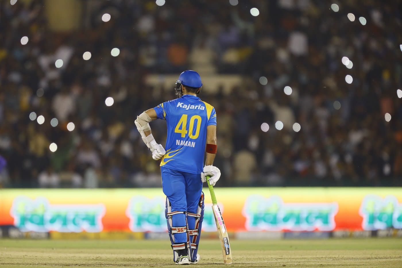 Naman Ojha pauses to catch a breath during his innings