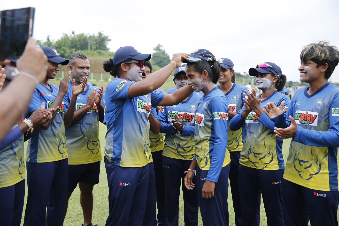 Kaushani Nuthyangana receives her T20I cap from Chamari Athapaththu