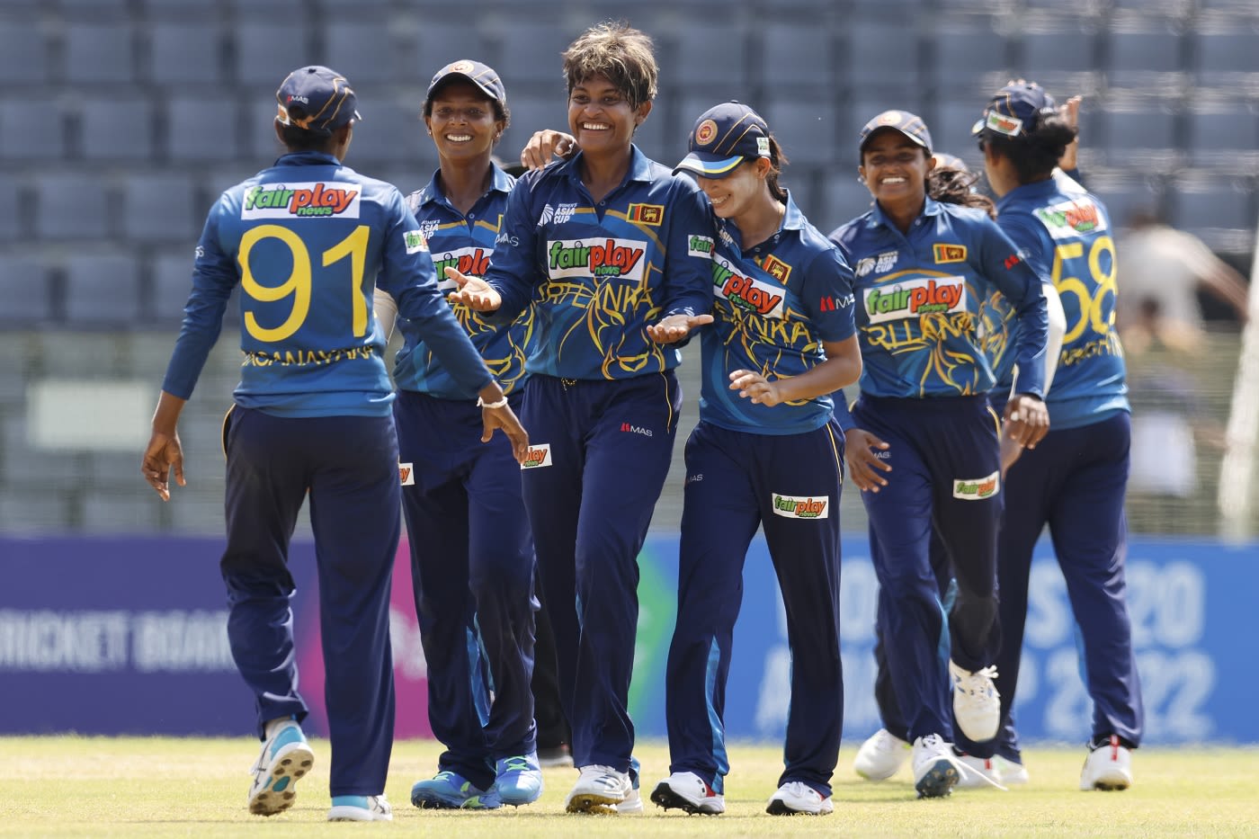 The Sri Lanka players congratulate Malsha Shehani after the final wicket
