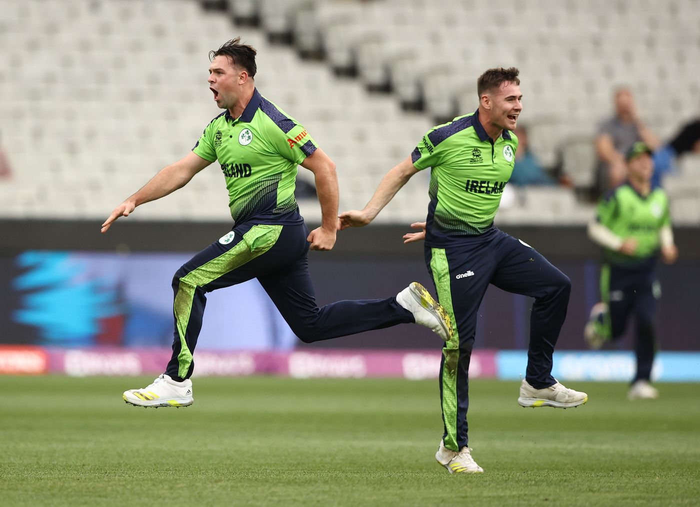 Fionn Hand and Josh Little celebrate after the former bowls Ben Stokes