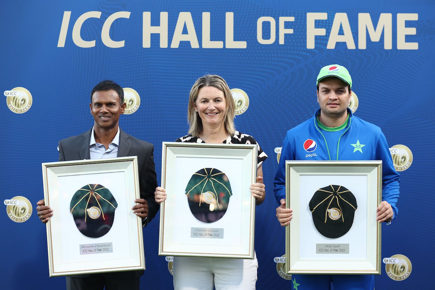 [L to R] Shivnarine Chanderpaul, Charlotte Edwards and the late Abdul Qadir's son Usman Qadir pose with the ICC Hall of Fame trophies