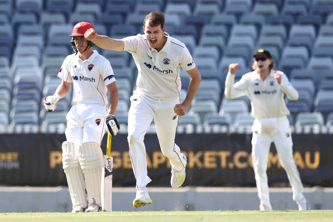 Matthew Kelly celebrates a wicket