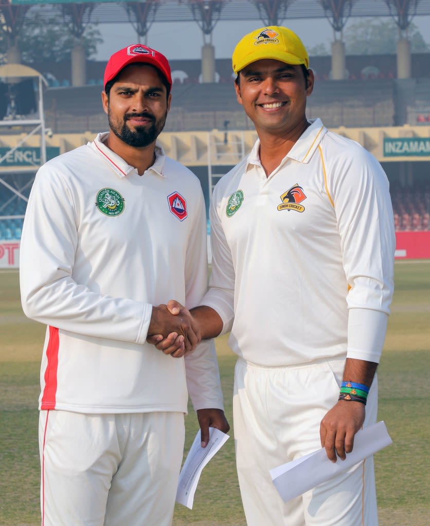 Umar Amin and Khurram Manzoor, the two captains, at the toss