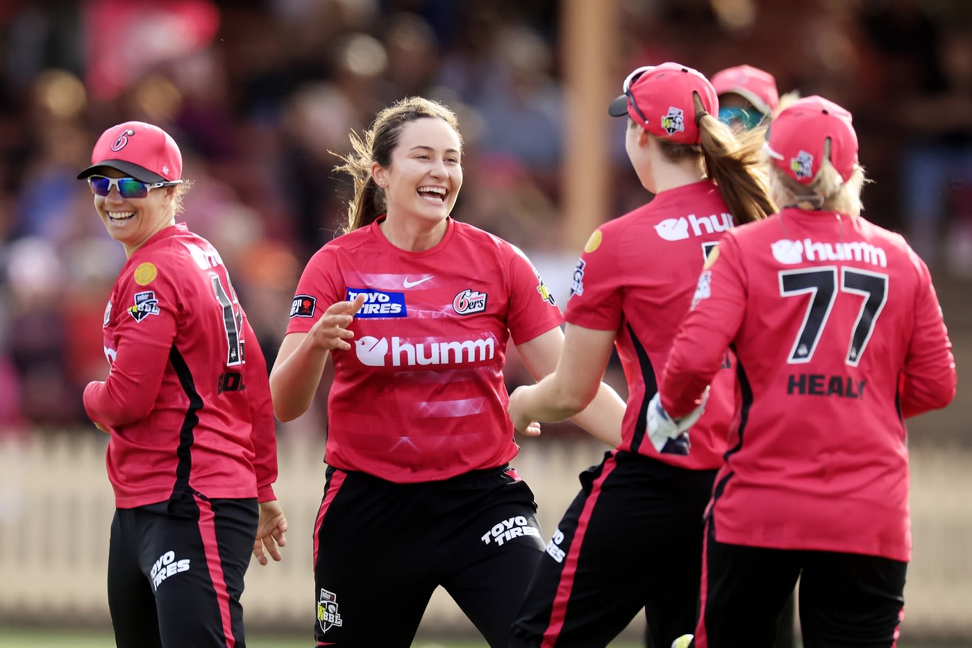 Kate Peterson is all smiles after sending back Laura Wolvaardt in her first over