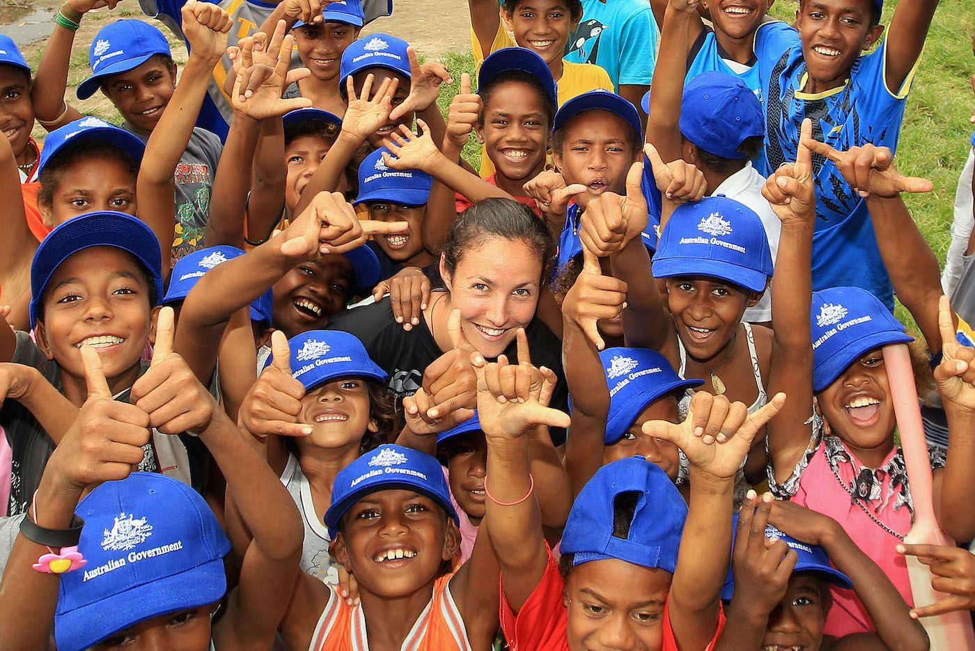 Sara McGlashan coaches local children in Mele village