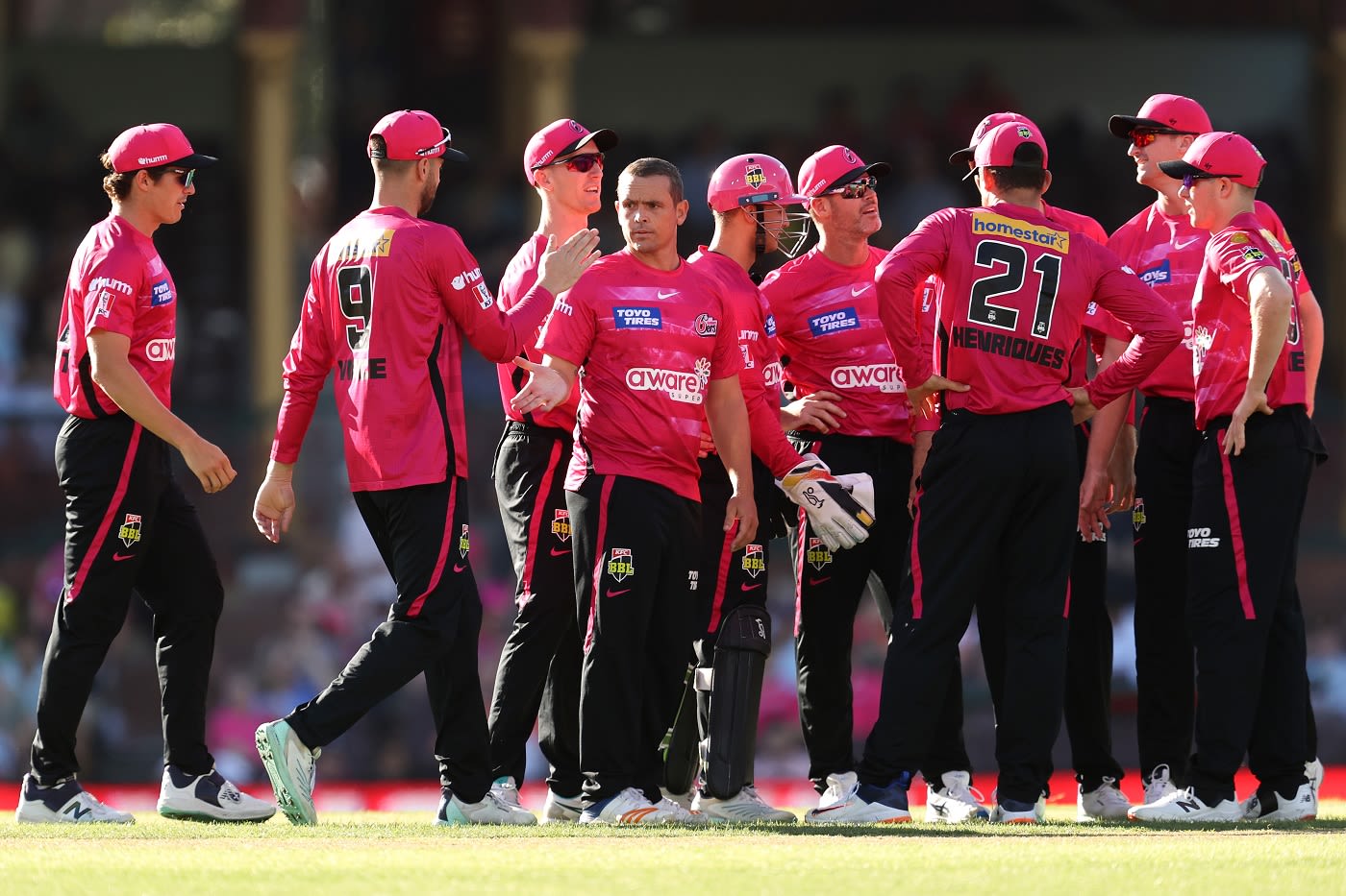 Players gather after Steve O'Keefe struck second ball