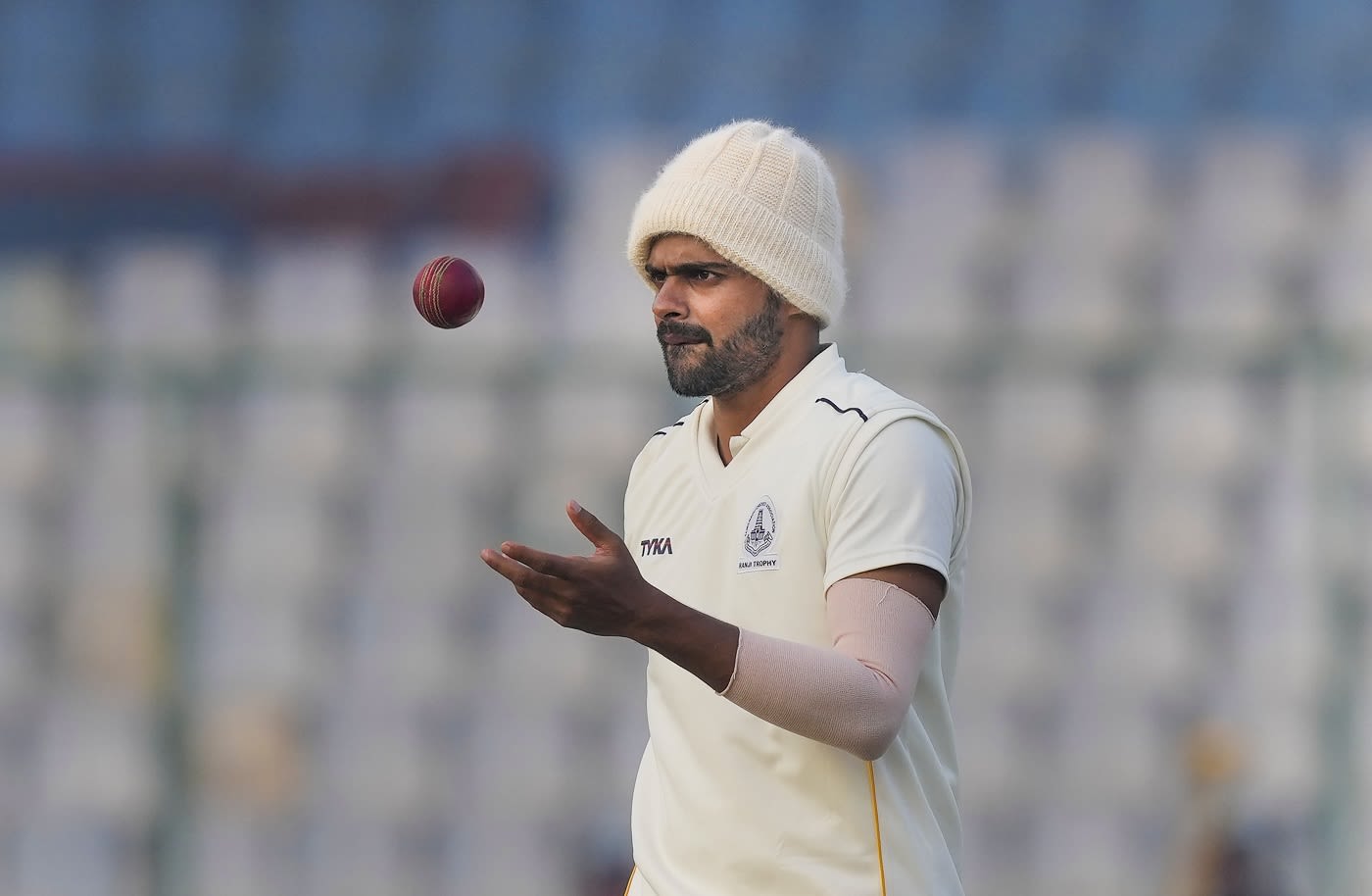 L Vignesh bowled with a woolen cap on a chilly morning