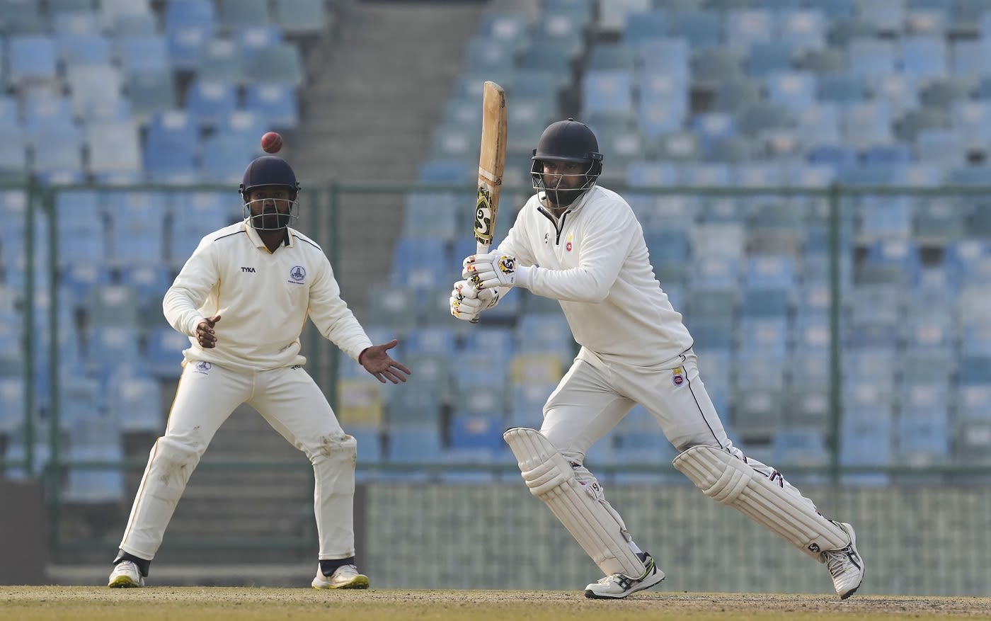 Delhi's Vaibhav Rawal dabs one away