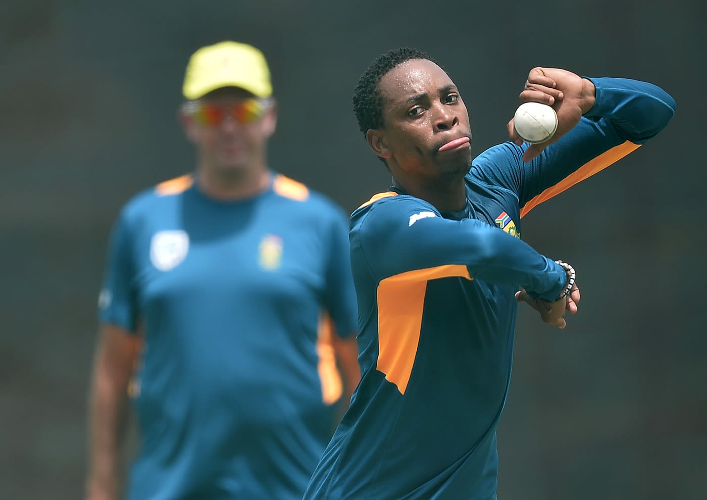 Aaron Phangiso bowls at the nets