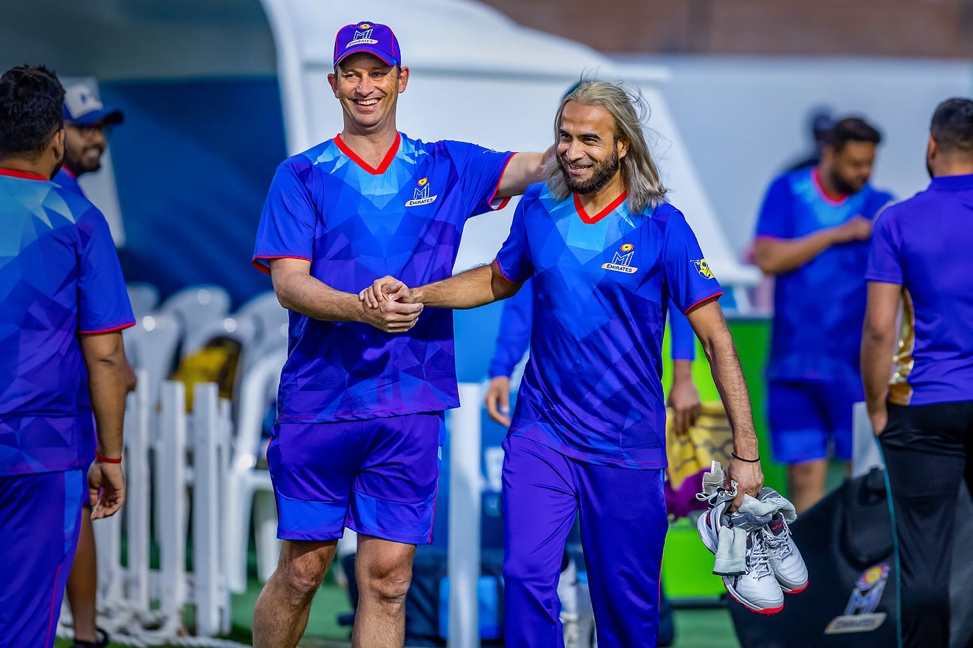 MI Emirates head coach Shane Bond with Imran Tahir during training