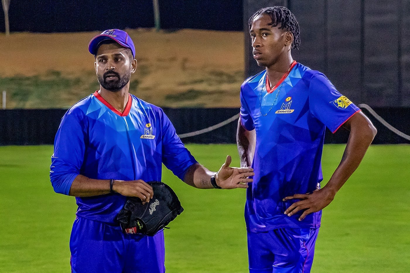 MI Emirates bowling coach R Vinay Kumar chats with McKenny Clarke