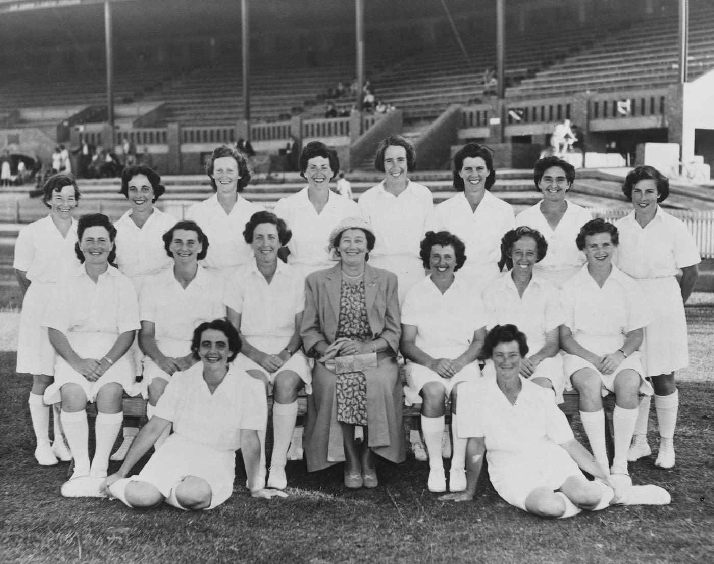The 1951 Australian Women's Cricket Team from left to right (back row), Valma Batty, Alma Vogt, Myrtle Baylis, Mavis Jones, Ruth Dow, Betty Wilson, Dot Laughton, Gladys Phillips, (front row sitting) Mary Allitt, Joan Schmidt, Mollie Dive (team captain), Ray Miller (team manager), Una Paisley, Amy Hudson, Norma Whiteman and sitting on the ground Lorna Larter and June James