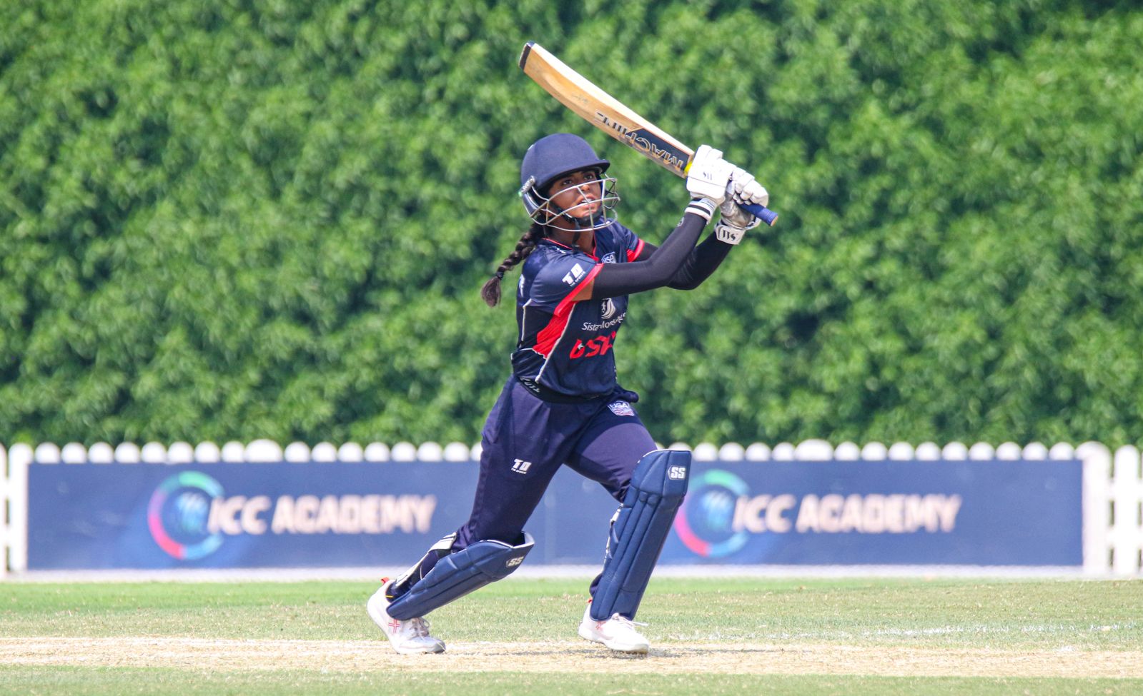 Allrounder Ritu Singh drives a boundary over mid-off during USA's tour of the UAE