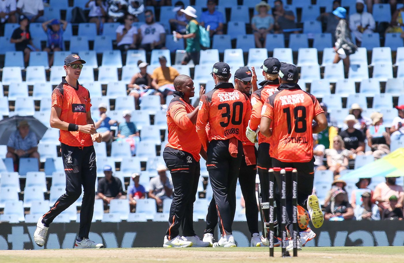 Sisanda Magala and team-mates celebrate as Marco Jansen joins