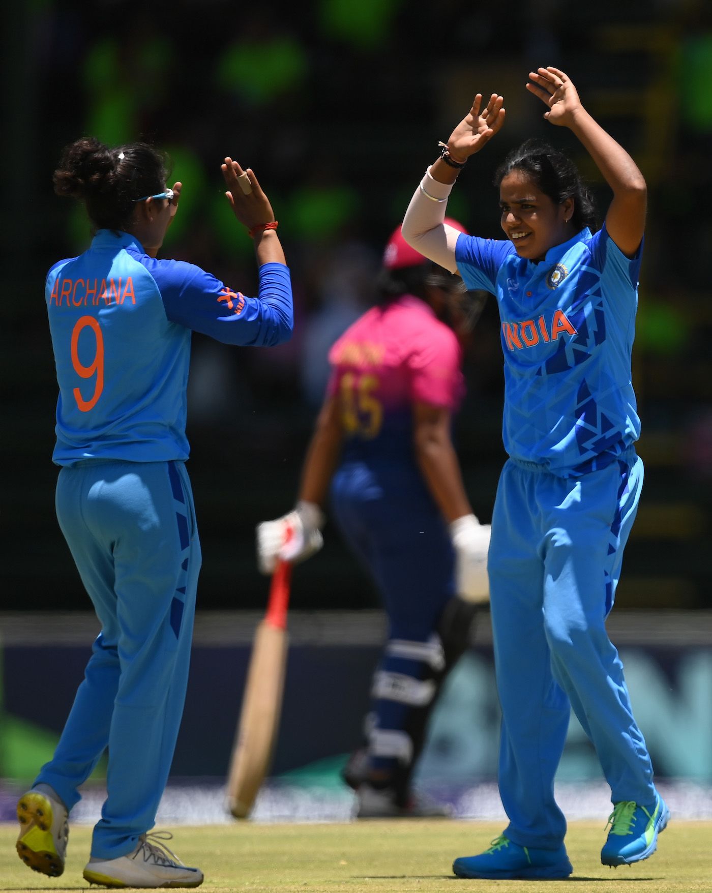 Mannat Kashyap celebrates after taking the wicket of Rinitha Rajith