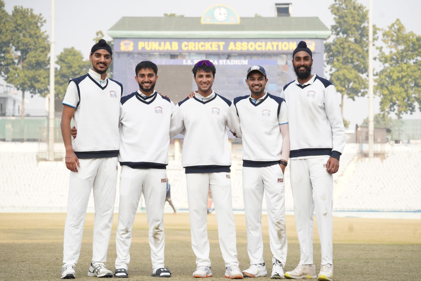 Arshdeep Singh, Mayank Markande, Abhishek Sharma, Siddarth Kaul and Baltej Singh pose after the game