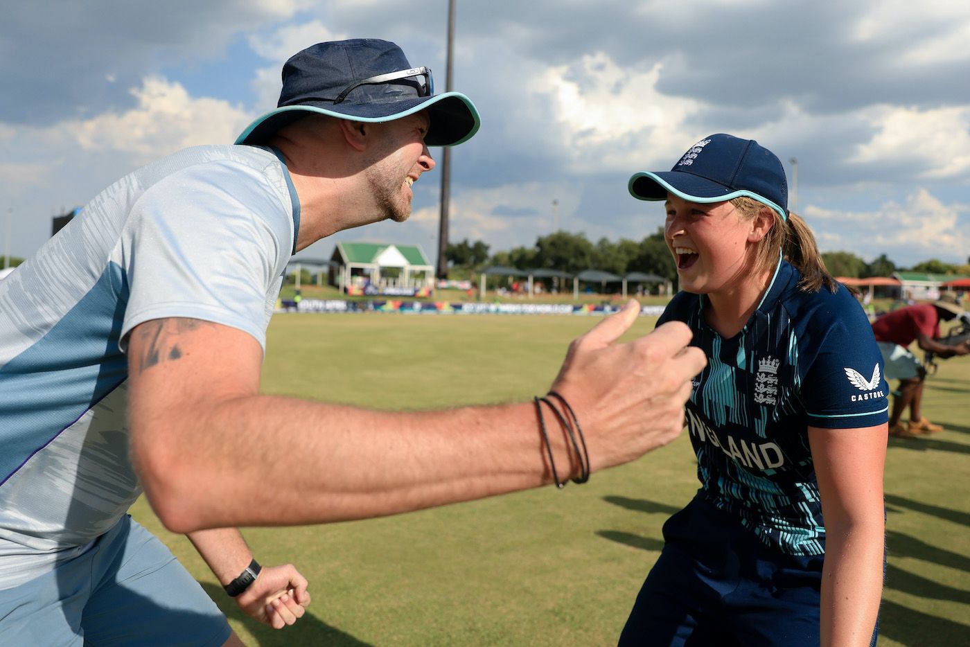 Grace Scrivens and coach, Chris Guest, celebrate