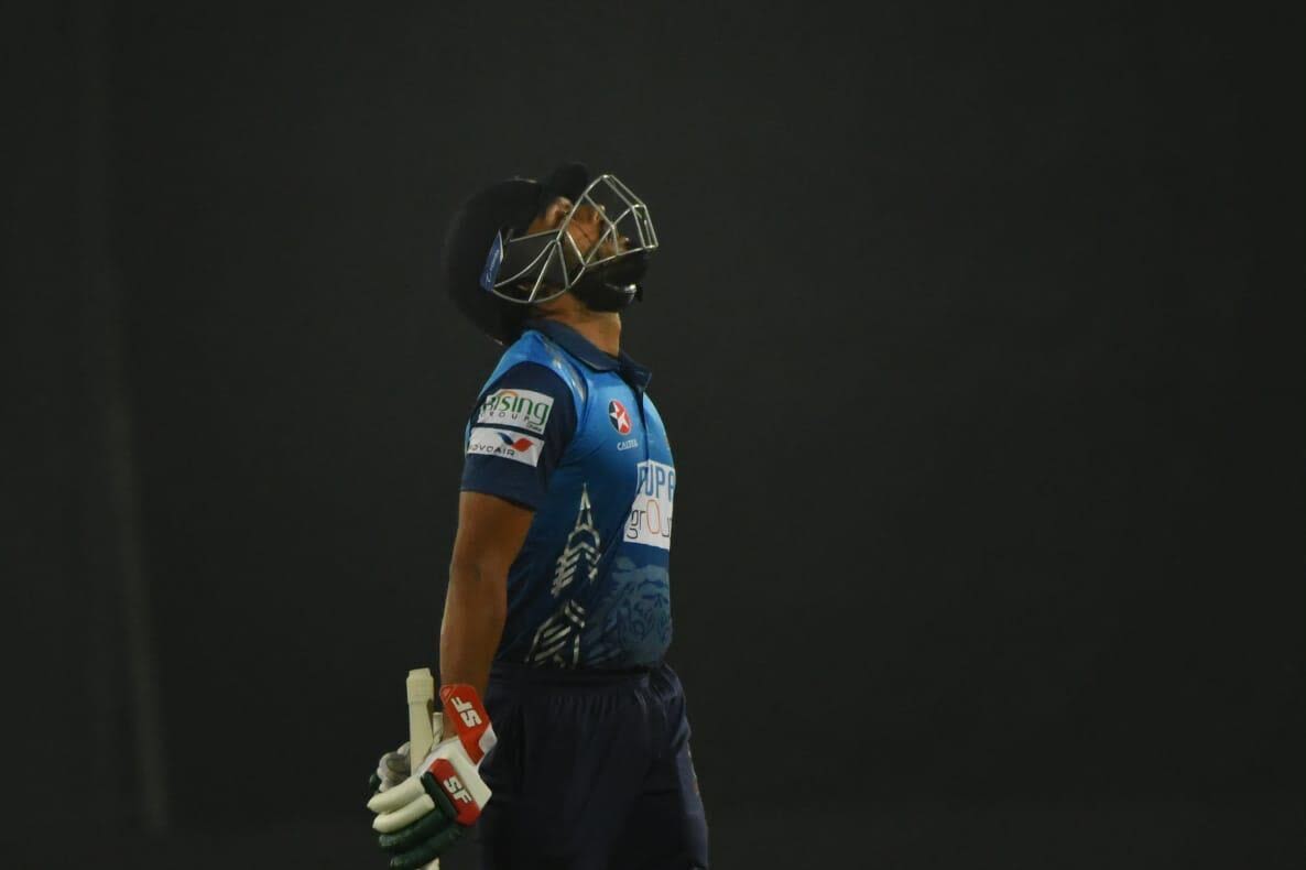 Mohammad Mithun walks back after being dimissed