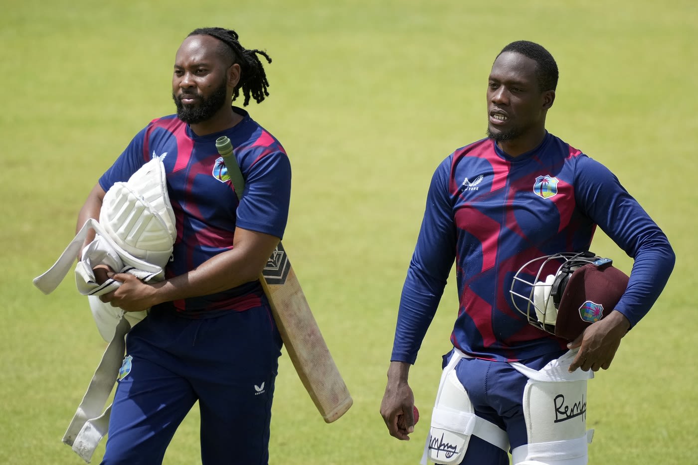 Nkrumah Bonner and Jomel Warrican walk back after a practice session