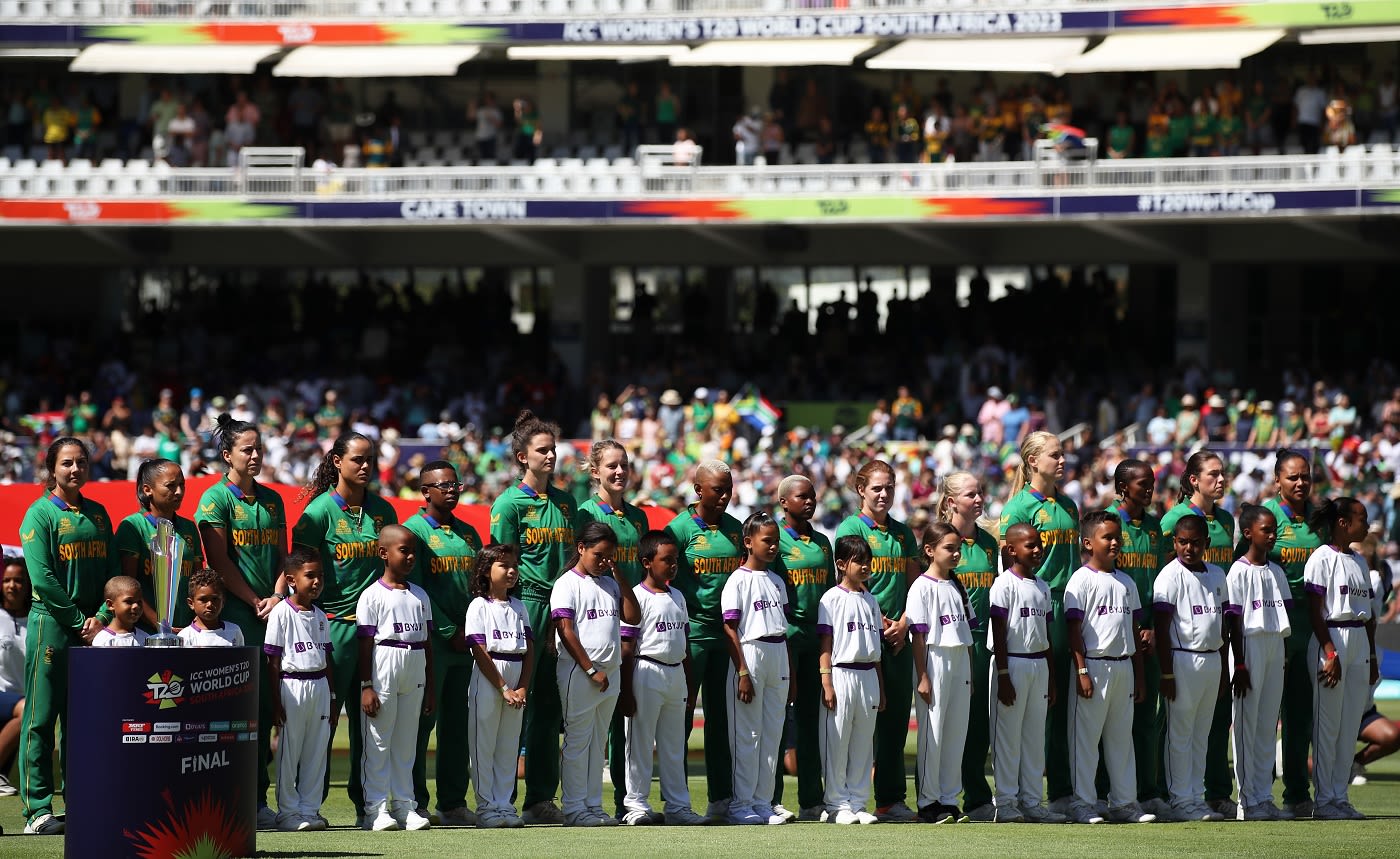 Players line up for the national anthem