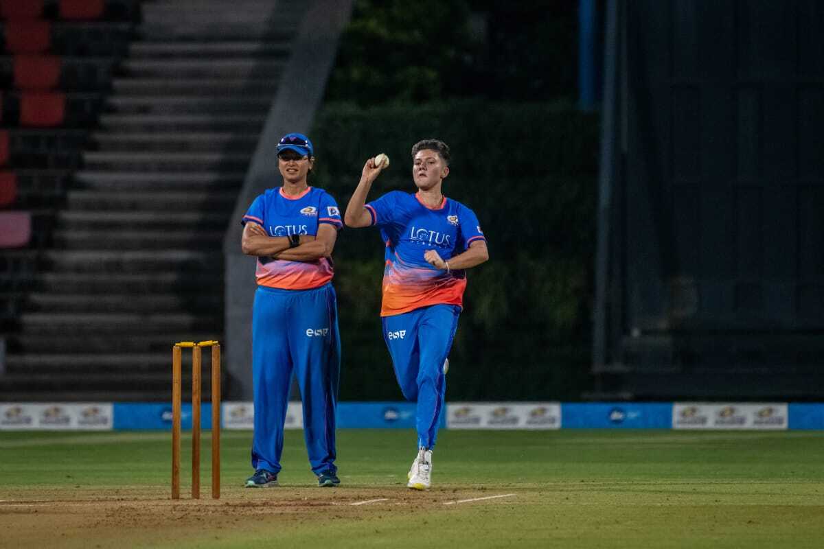 Issy Wong trains in the Mumbai Indians nets with batting coach Devika Palshikar watching