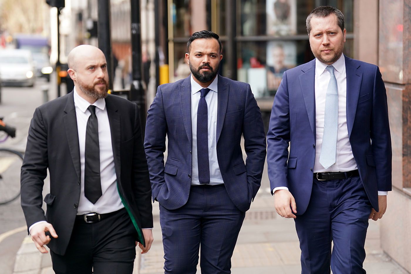 Azeem Rafiq (centre) arrives for the CDC Panel Hearing at the International Arbitration Centre, London