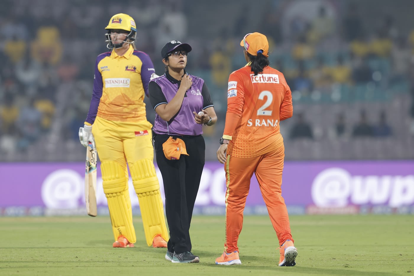 Umpire Gayathri Venugopalan talks to Sneh Rana after Gujarat Giants took a late DRS review