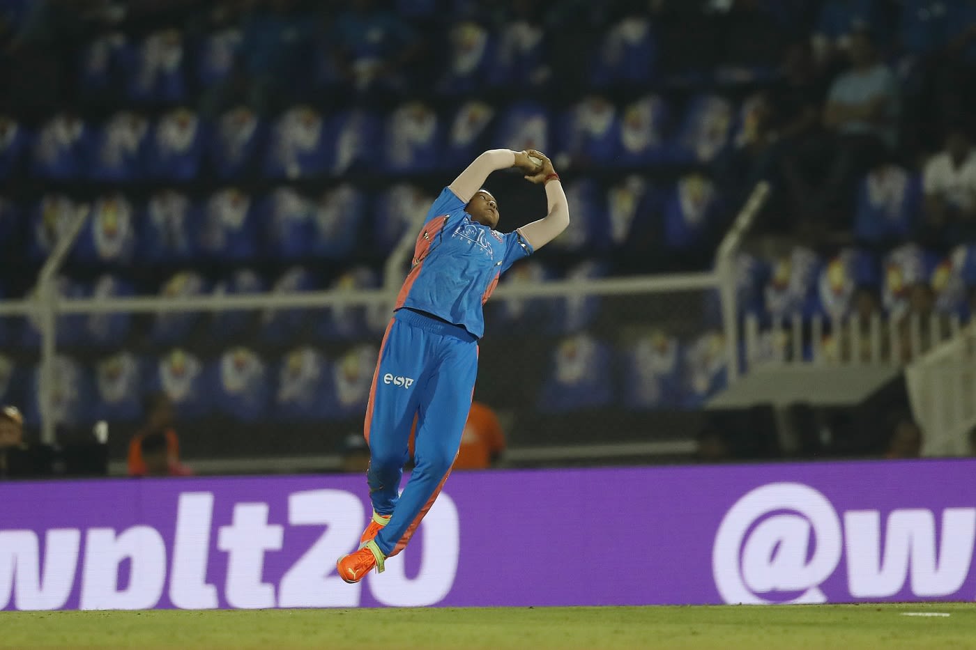 Jintimani Kalita goes airborne to complete a spectacular catch