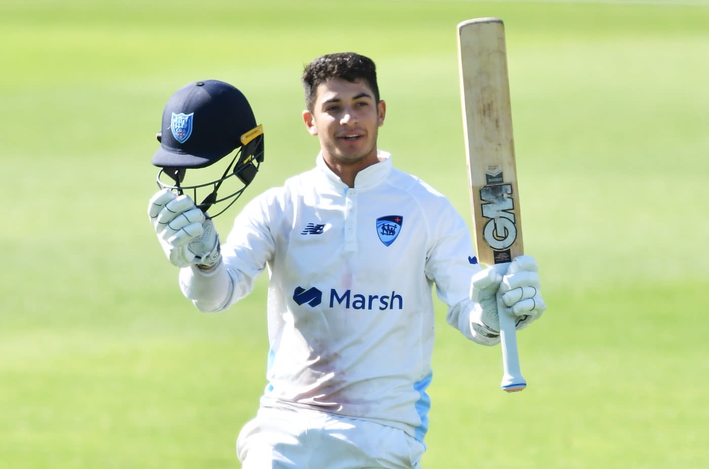 Ryan Hackney celebrates his maiden first-class century