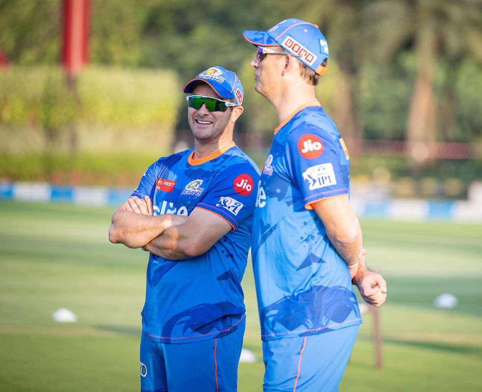 Mark Boucher and Shane Bond catch up at a Mumbai Indians training session