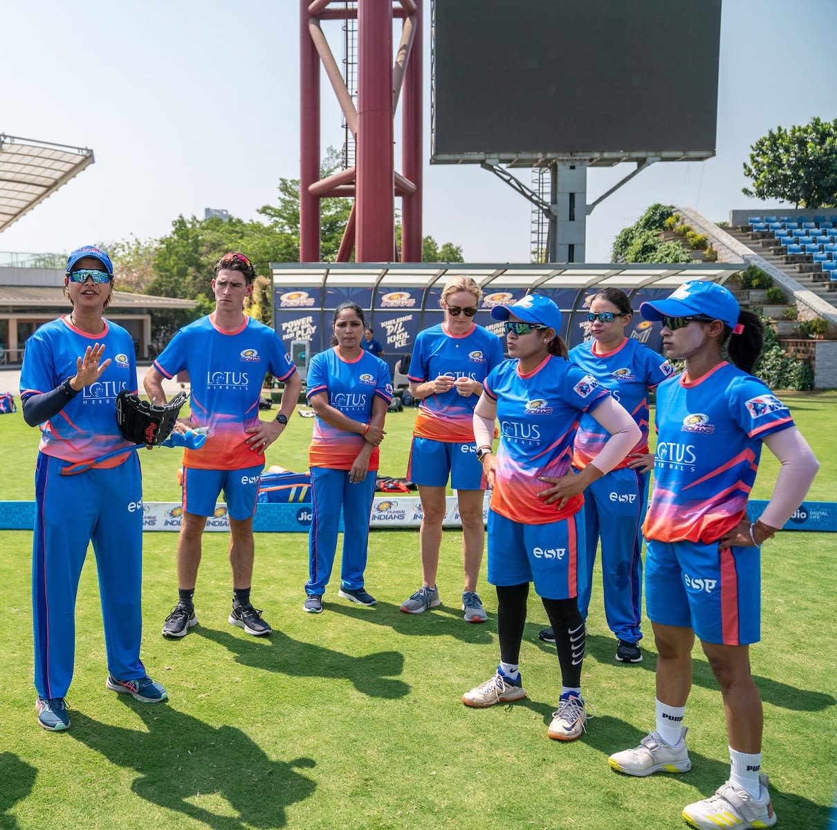 MI batting coach Devika Palshikar (extreme left) and and Benjamin Hoppitt, performance and data analyst, at a practice session