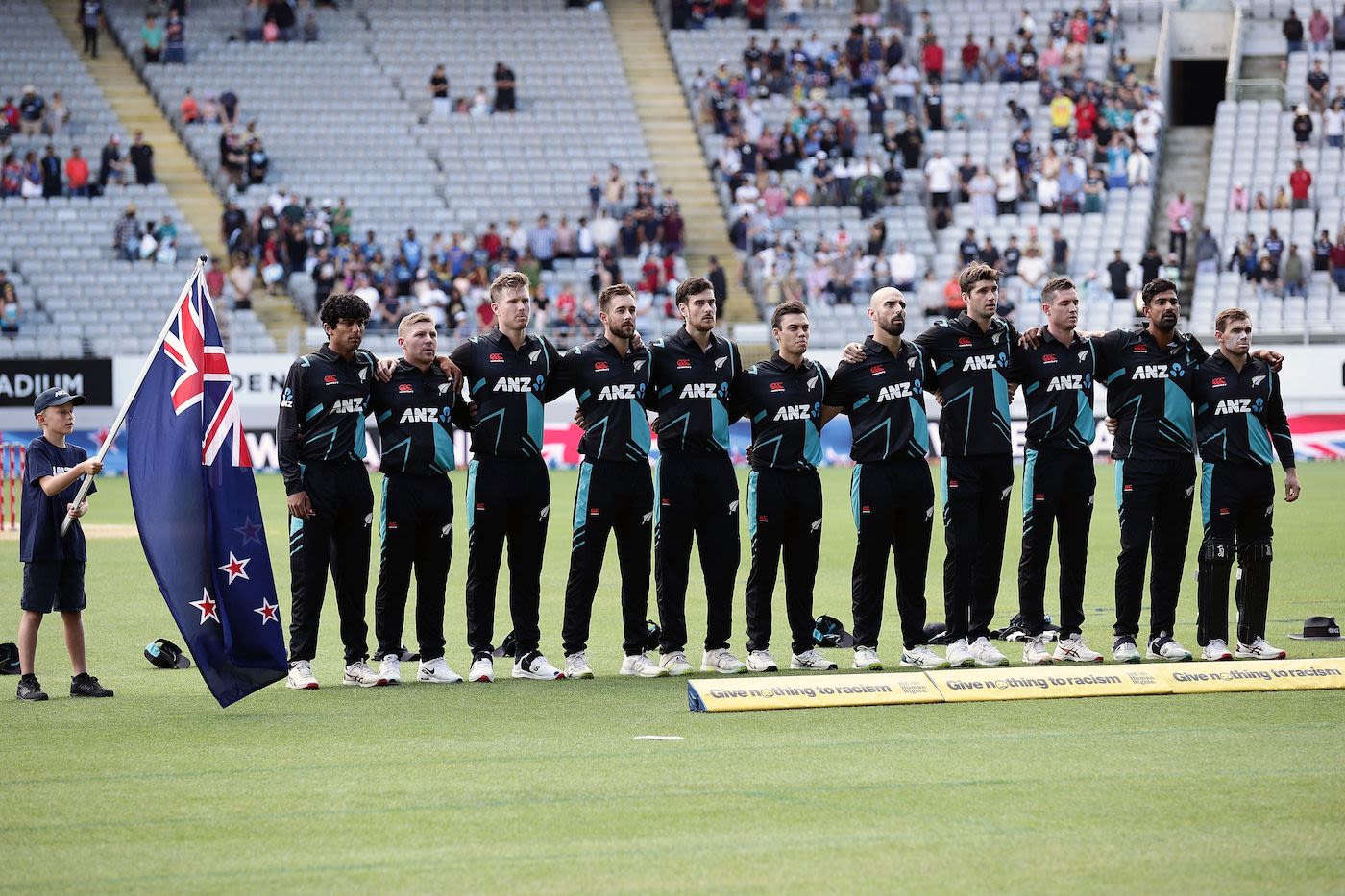 New Zealand's players at the national anthem