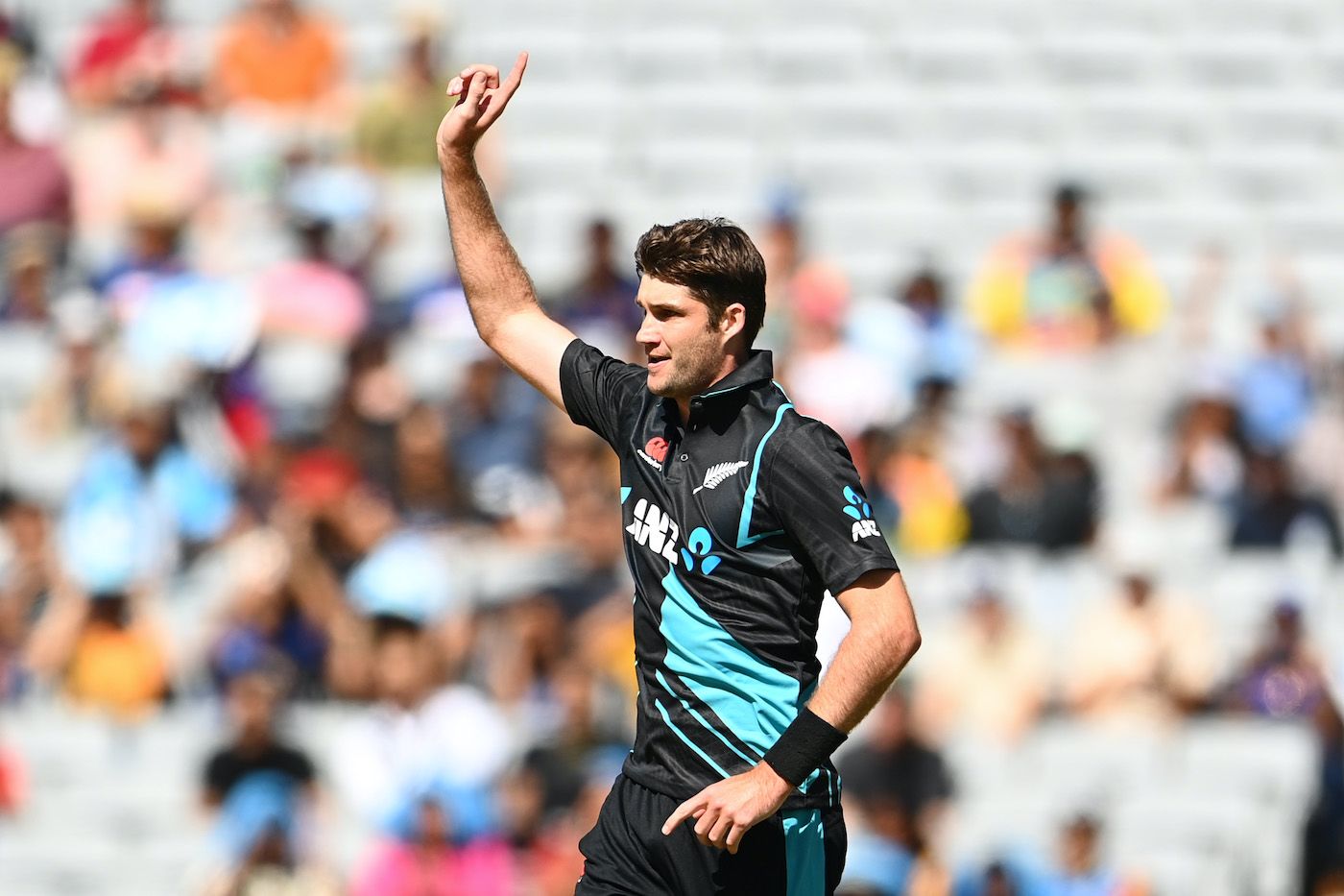Henry Shipley celebrates his maiden T20I wicket
