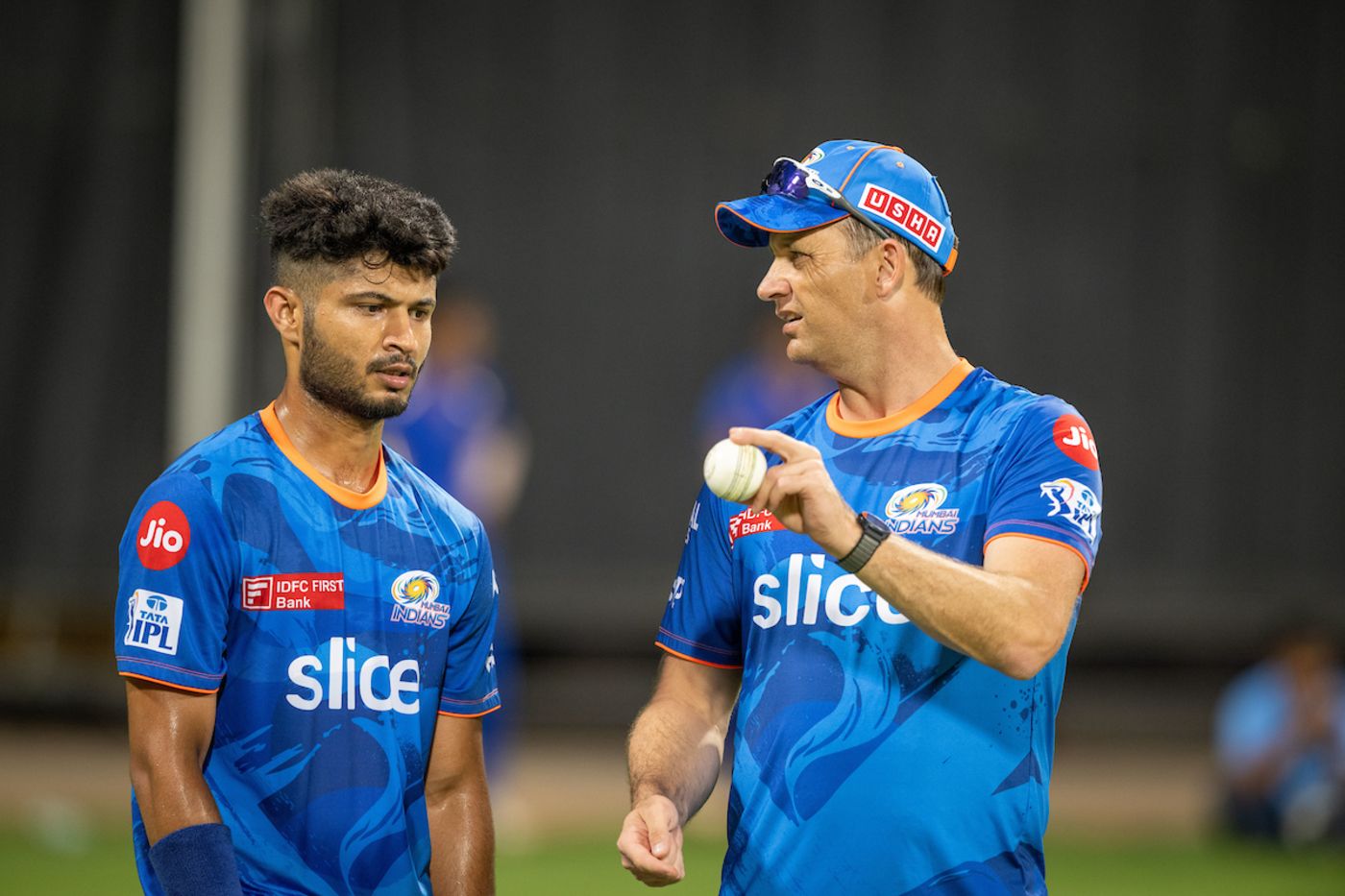 Arshad Khan has a chat with Mumbai Indians' bowling coach Shane Bond