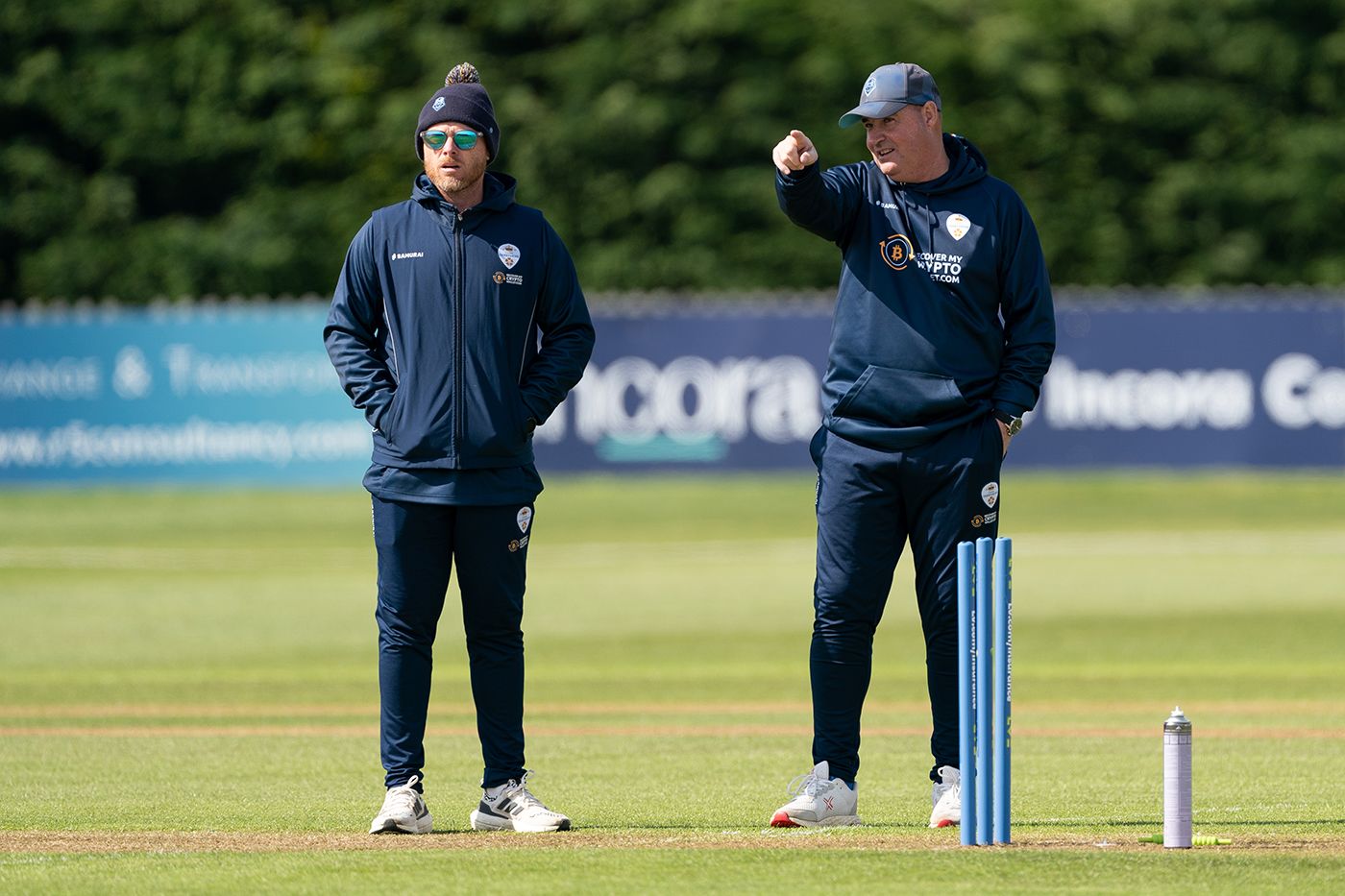 Ian Bell and Mickey Arthur inspect conditions out in the middle
