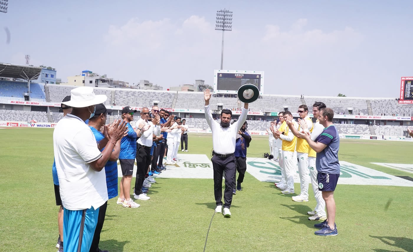Bangladesh and Ireland line up in a guard of honour for umpire Aleem Dar