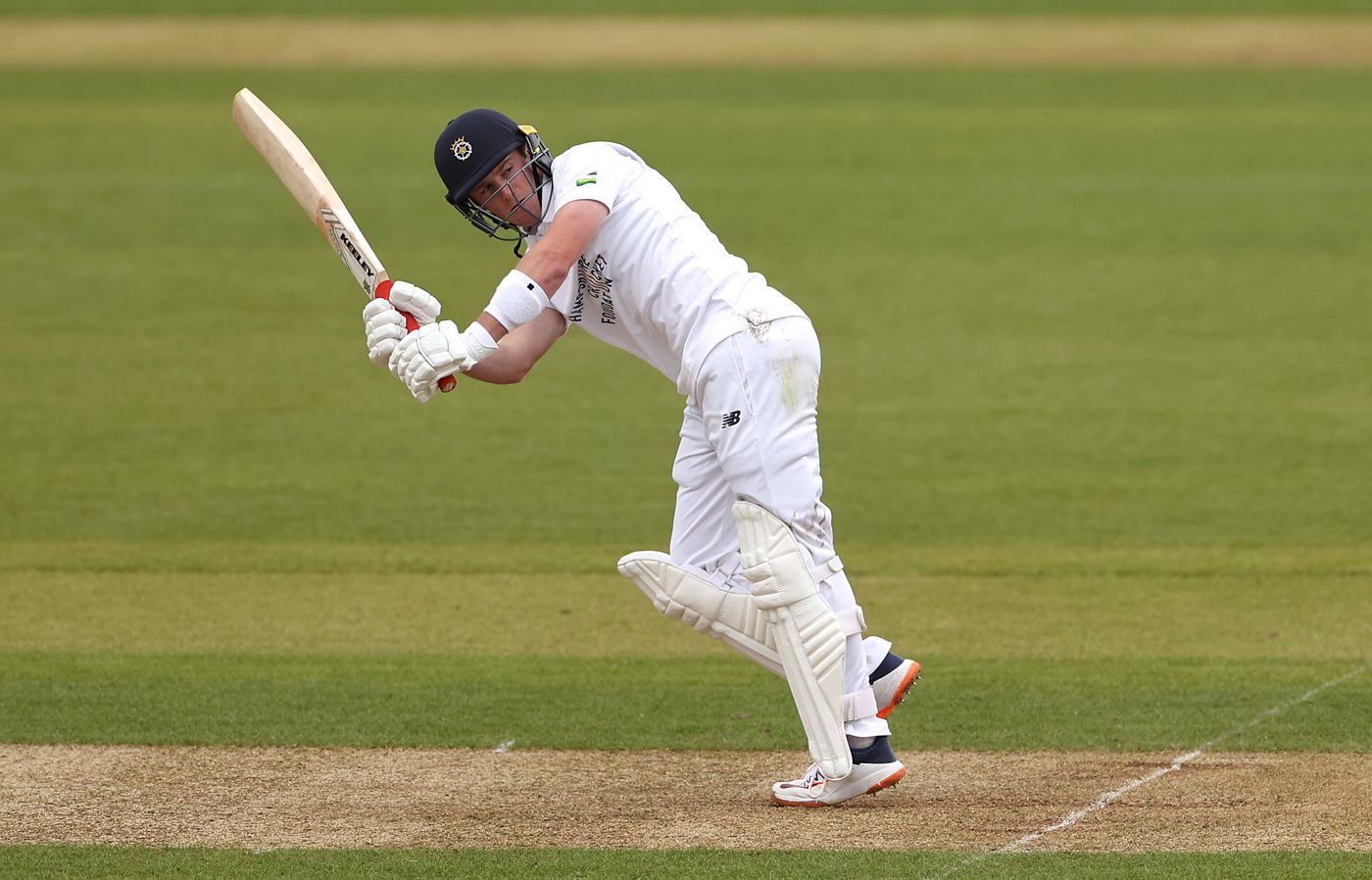 Fletcha Middleton tucks a ball to leg