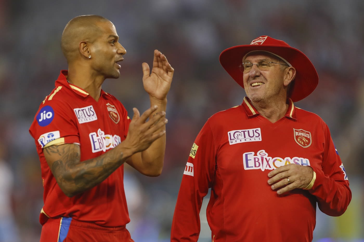 Shikhar Dhawan and Trevor Bayliss share a light moment