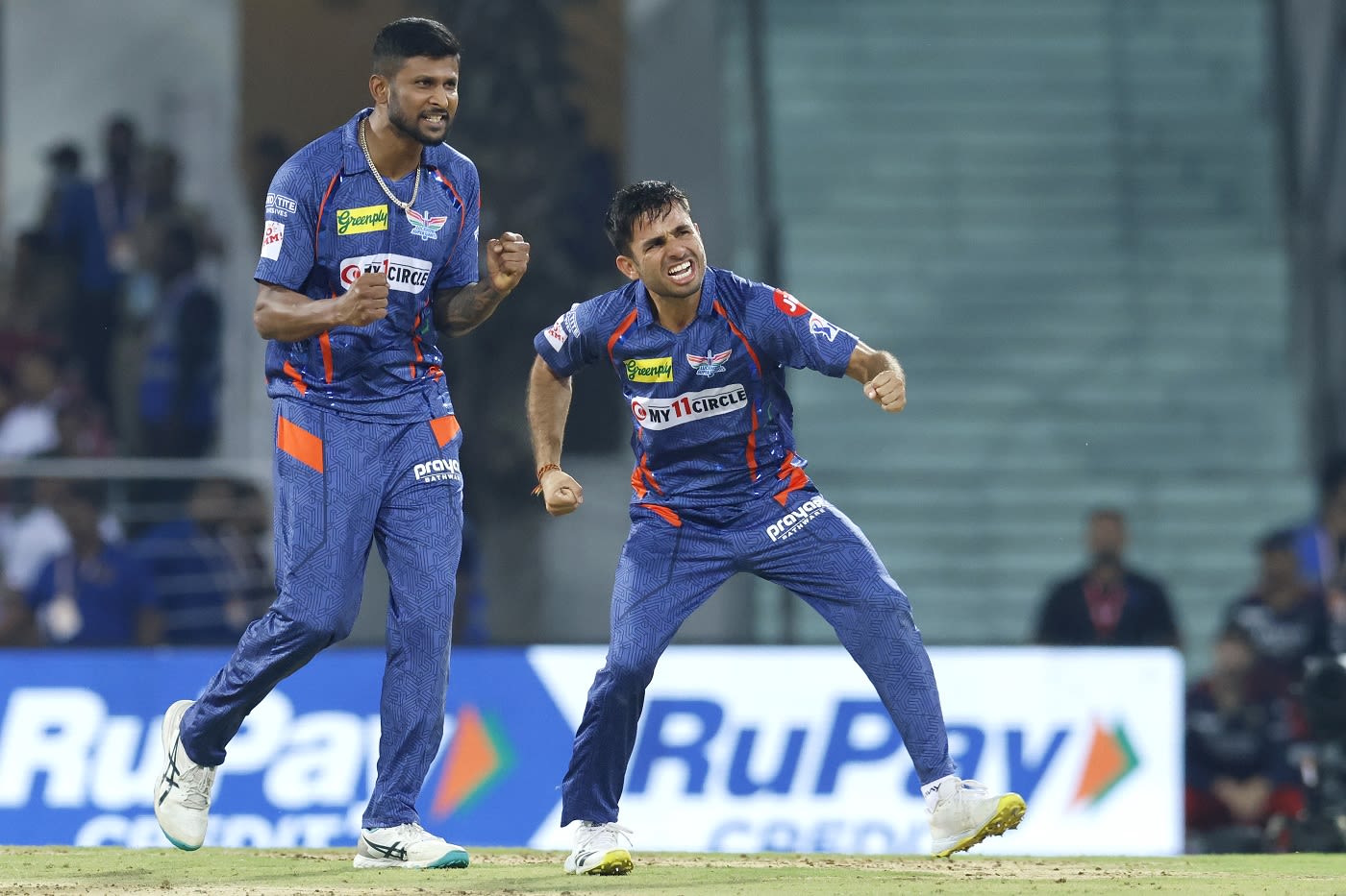 K Gowtham and Ravi Bishnoi exult after Glenn Maxwell was out