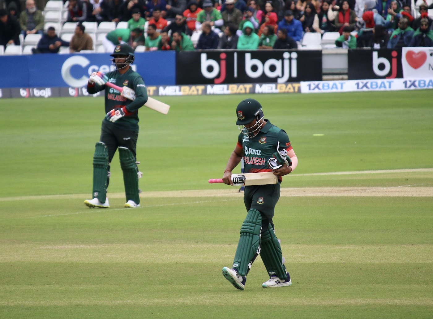 Rony Talukdar walks back after being dismissed for four