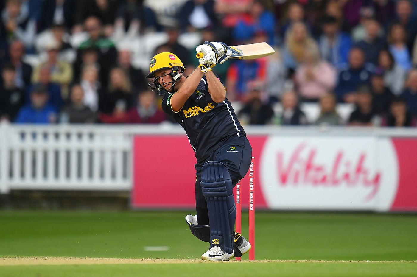 Chris Cooke flays through mid-off
