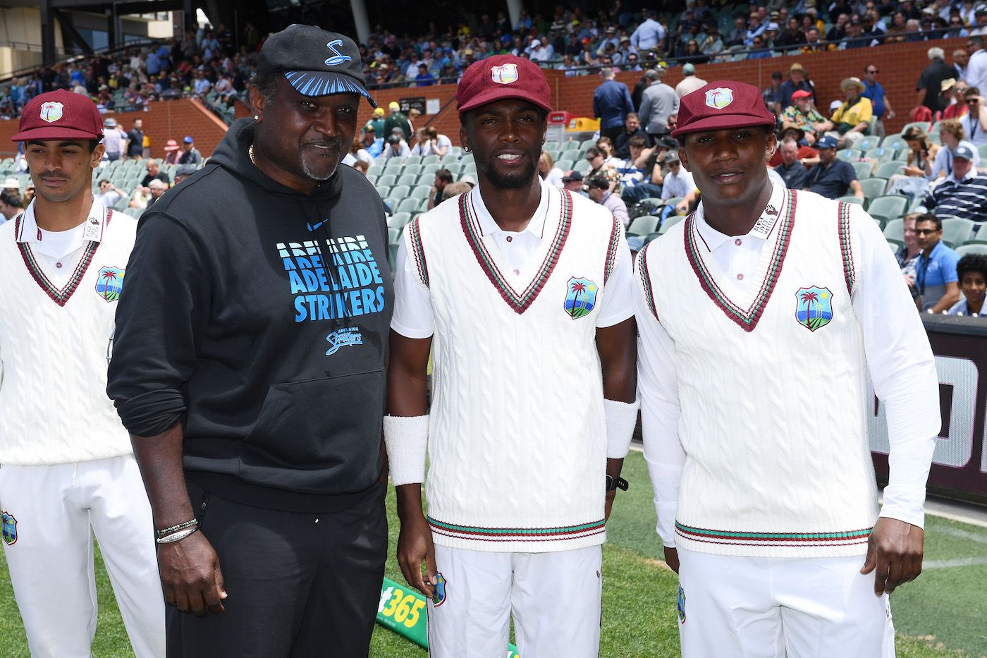 Carl Hooper with Marquino Mindley and Devon Thomas after handing out their West Indies Test caps