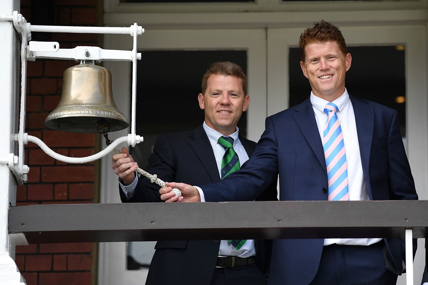 Niall and Kevin O'Brien ring the five-minute bell at Lord's
