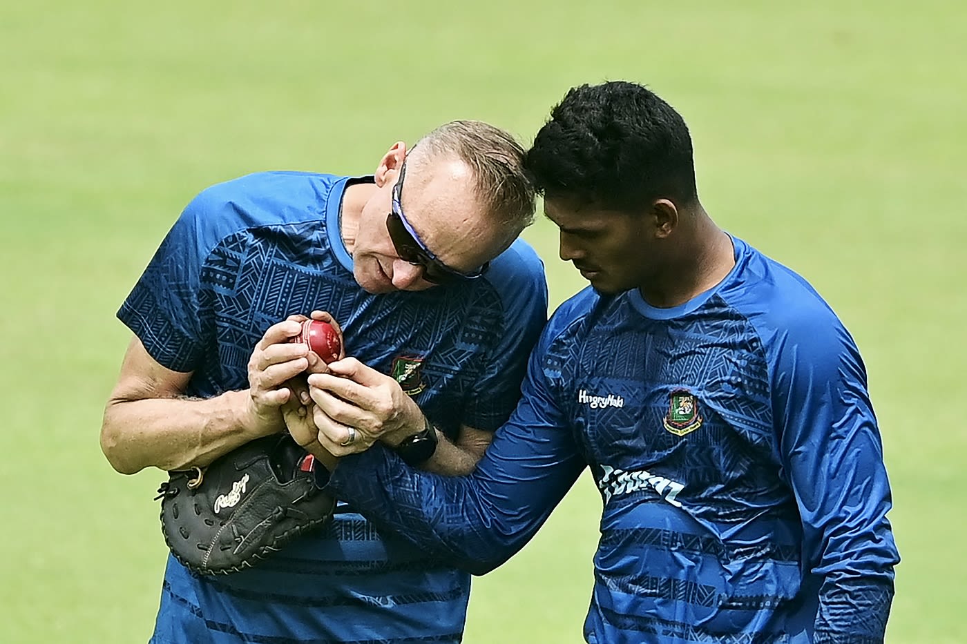 Bangladesh fast-bowling coach Allan Donald works with Musfik Hasan at the nets