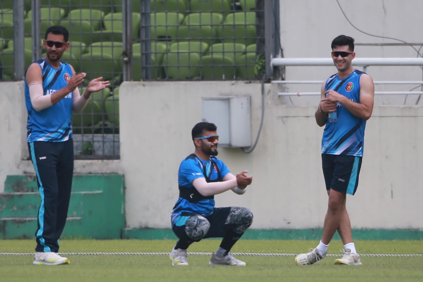Nijat Masood, Zahir Khan and Izharulhaq Naveed share a laugh