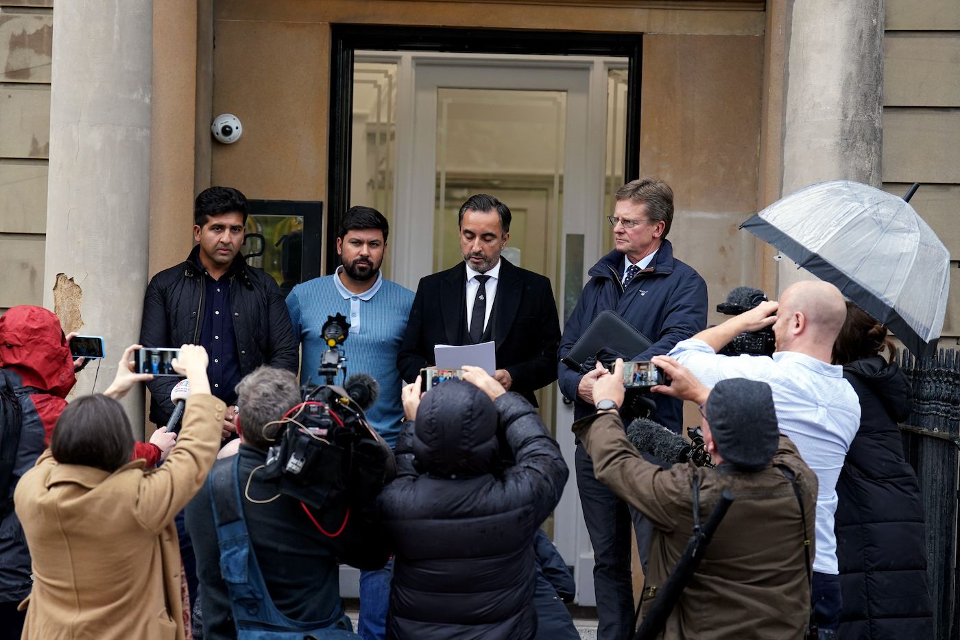 Majid Haq, Qasim Sheikh, Aamer Anwar and Gordon Arthur address the press after a meeting into the racism report