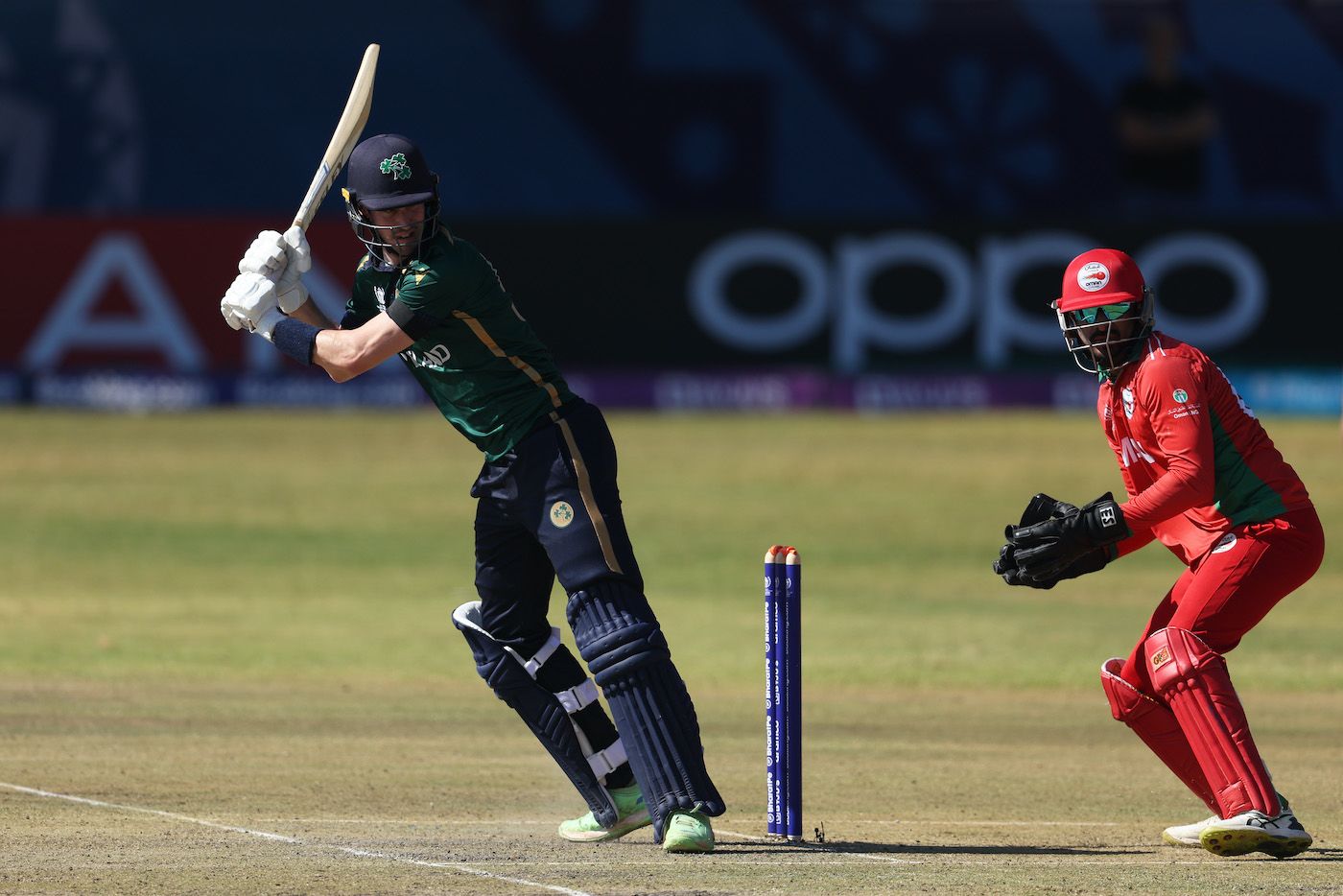 George Dockrell flicks the ball past Naseem Khushi