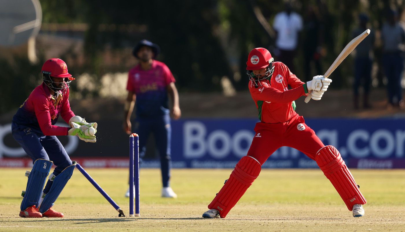 Vriitya Aravind watches Aqib Ilyas gets knocked over